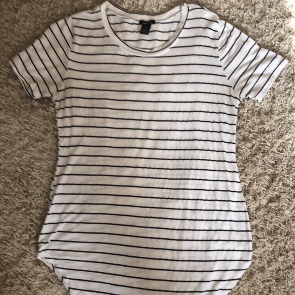 Selling a long white with black strips blouse!